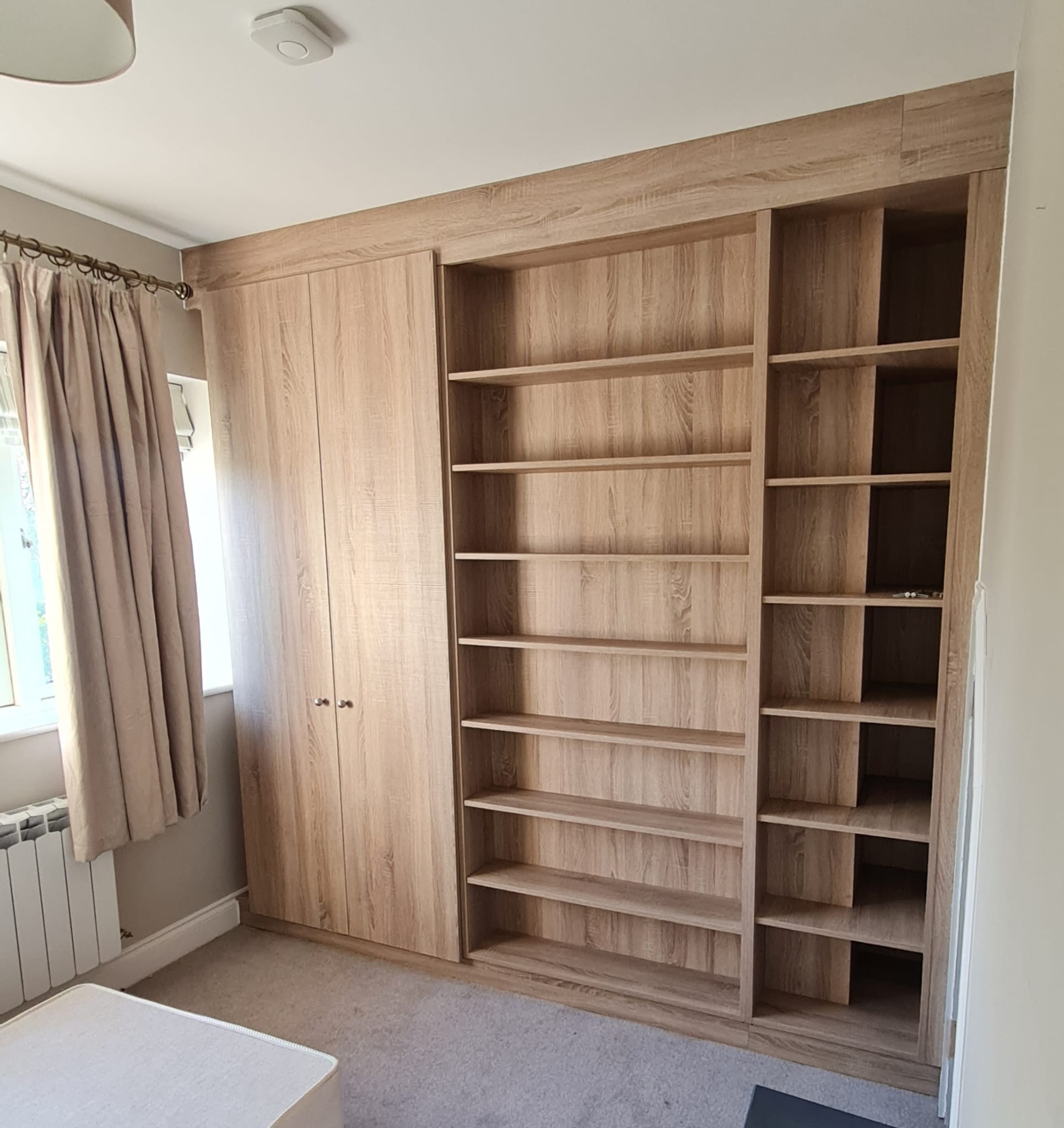 Fitted oak wardrobe and bookcase